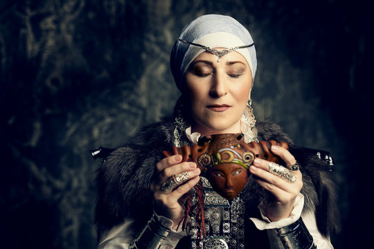 old lady with reedpipe