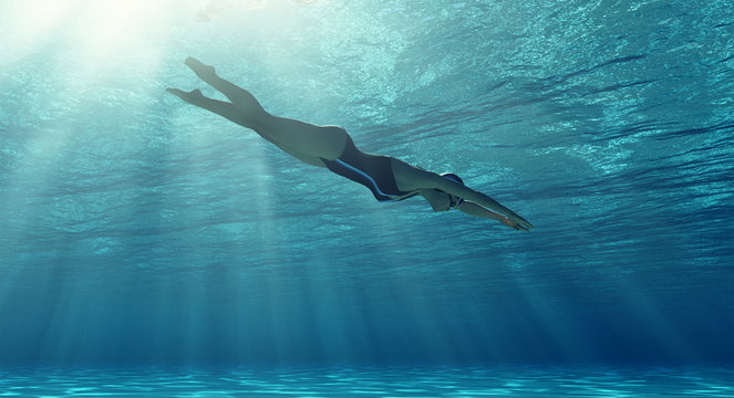 Woman Swimming Underwater In A Sea.