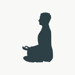 Businessman sit in meditation pose. Cutout silhouette.