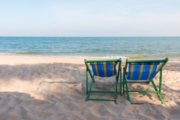 empty wooden beach chair at the beach