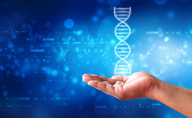 DNA and genetics research concept. Hand is holding glowing DNA molecule in medical technology background