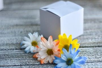soap and flower on wooden background