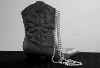 Pearls Hanging From Women's Cowboy Boots