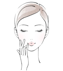 薬指でリップケアをする女性