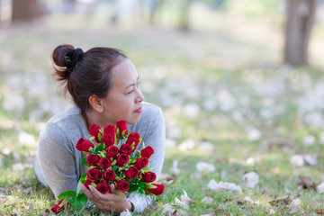 Happy Valentine's day, Beautiful woman holding bouquet rose red flower.