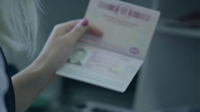 Checking passports at the airport check in