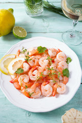 boiled shrimps on wooden surface