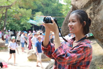 woman traveling to Hon Trong  Mai in Vietnam