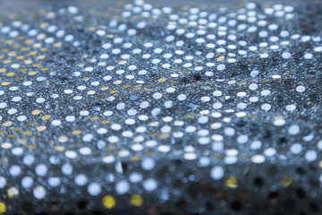 Texture of silver sequins. Close-up macro abstract background. Fabric with spangles