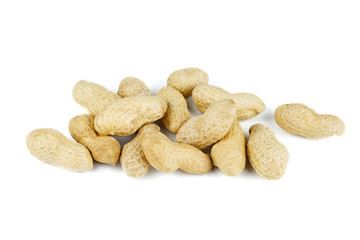 Pile of raw unshelled peanuts