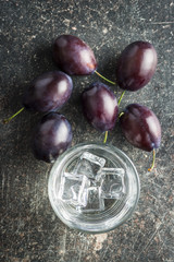 Plum brandy and plums.