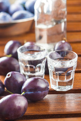 Plum brandy and plums.