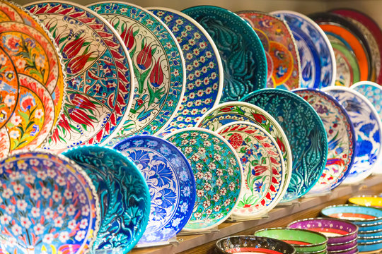 Classical traditional Turkish ceramics colorful dishes at the Istanbul Grand Bazaar. Istanbul, Turkey souvenirs.