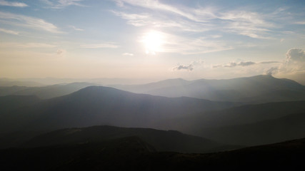 Fototapeta na wymiar Sunset in the mountains with a bird's eye view