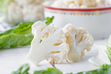 Organic cauliflower on wooden background