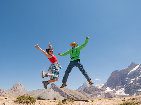 couple hiking in mountains