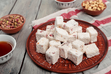Turkish delight on a wooden table.
