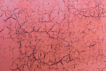 painted iron surface with a large rusty and metal corrosion