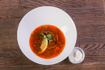 Solyanka soup with lemon