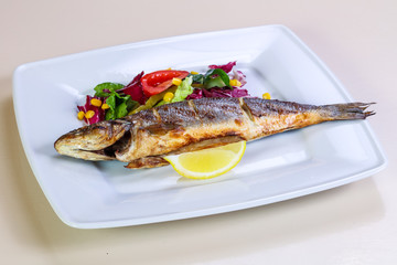 Grilled seabass with lemon