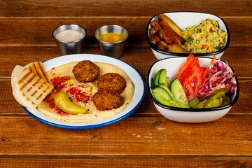 Tasty hummus with falafel