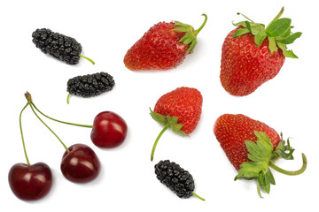 Cherry, mulberry and strawberry isolated on white