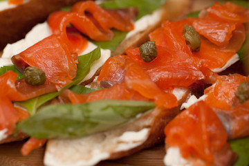 few delicious mouth-watering sandwich on white bread with salmon