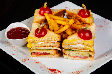 Club sandwich with french potato
