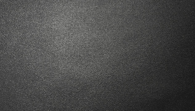 Background texture of shiny black metal foil