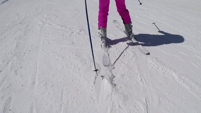 Closeup Of The Skier Foot Skiing Down The Mountainside In Winter