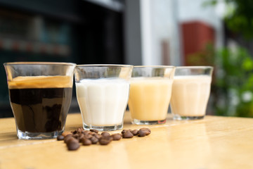 Close-up how to make ice latte coffee, the ingredients espresso and milk