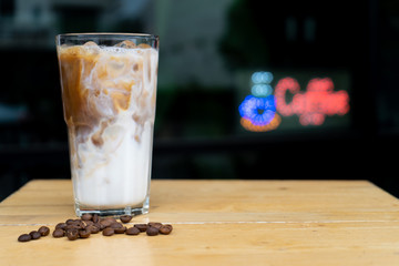 Close-up how to make ice latte coffee, ice latte on wood table