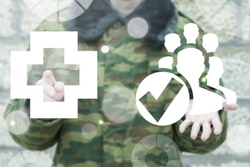 Soldier offers people with check mark and clicks a medical cross icon on a virtual interface....