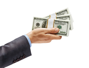 Man's hand in suit giving bundles of money isolated on white background. High resolution product. Close up