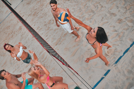 Friends Playing Volleyball