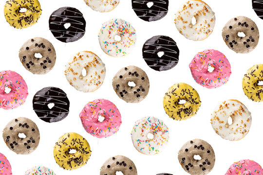 sweet decorative dougnuts stack up isolated in white background