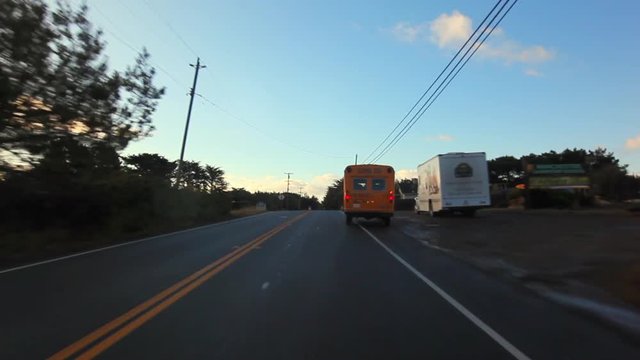 Moving Forward: Small School Bus on the Road