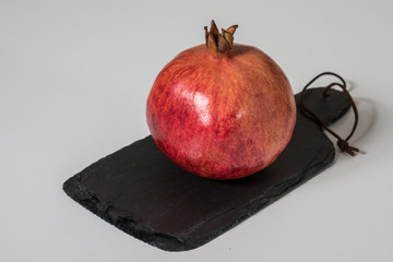 Pomegranate on a board