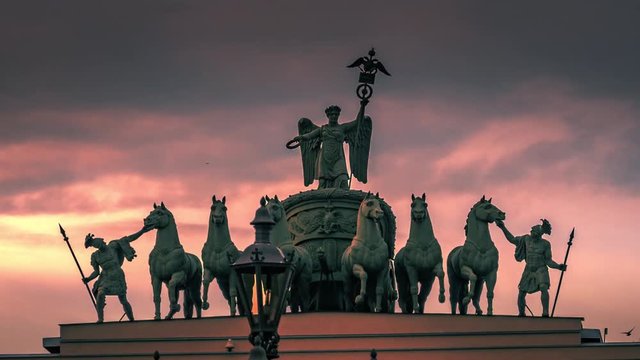 Hyperlapse of Statue of Glory in 6-horse Chariot of Victory on the General Staff Building on Palace Square in St. Petersburg, Russia. 4K UHD timelapse.