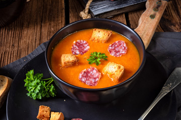 Hungarian paprika cream soup with spicy sausage