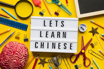 Lets learn chinese lightbox message on a bright yellow background
