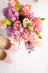  Bouquet of spring flowers: carnations, hyacinth, lilac, rose, tulip