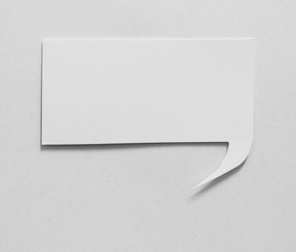 Blank Speech Bubble On White Paper Background