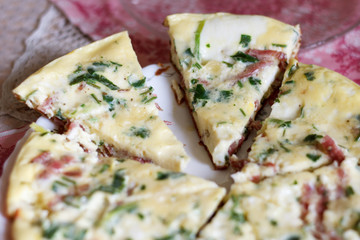 tasty magnificent omelet with greens and sausage