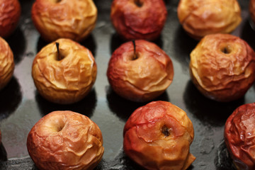 Baked apples on a baking sheet