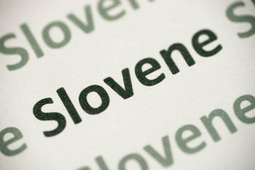 word Slovene language printed on paper macro