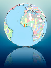 Ivory Coast on political globe with flags
