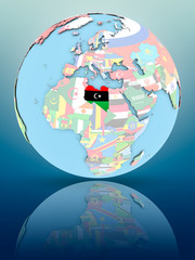 Libya on political globe with flags