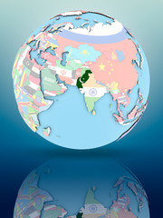 Pakistan on political globe with flags