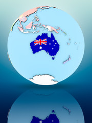 Obraz premium Australia on political globe with flags